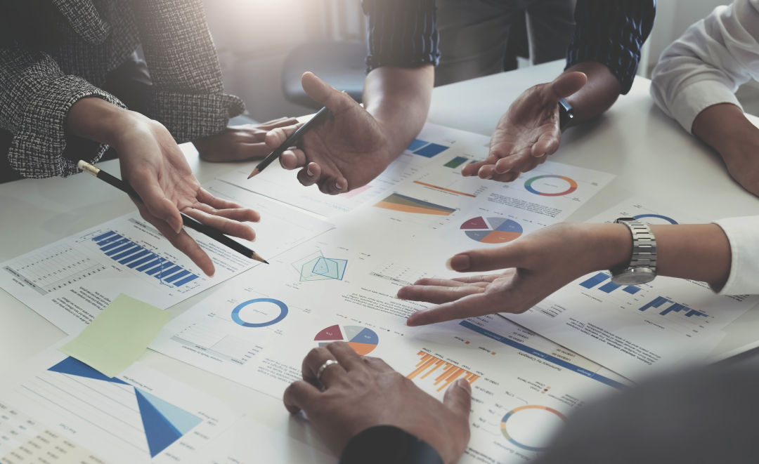 Team of business people working together in the meeting room office.